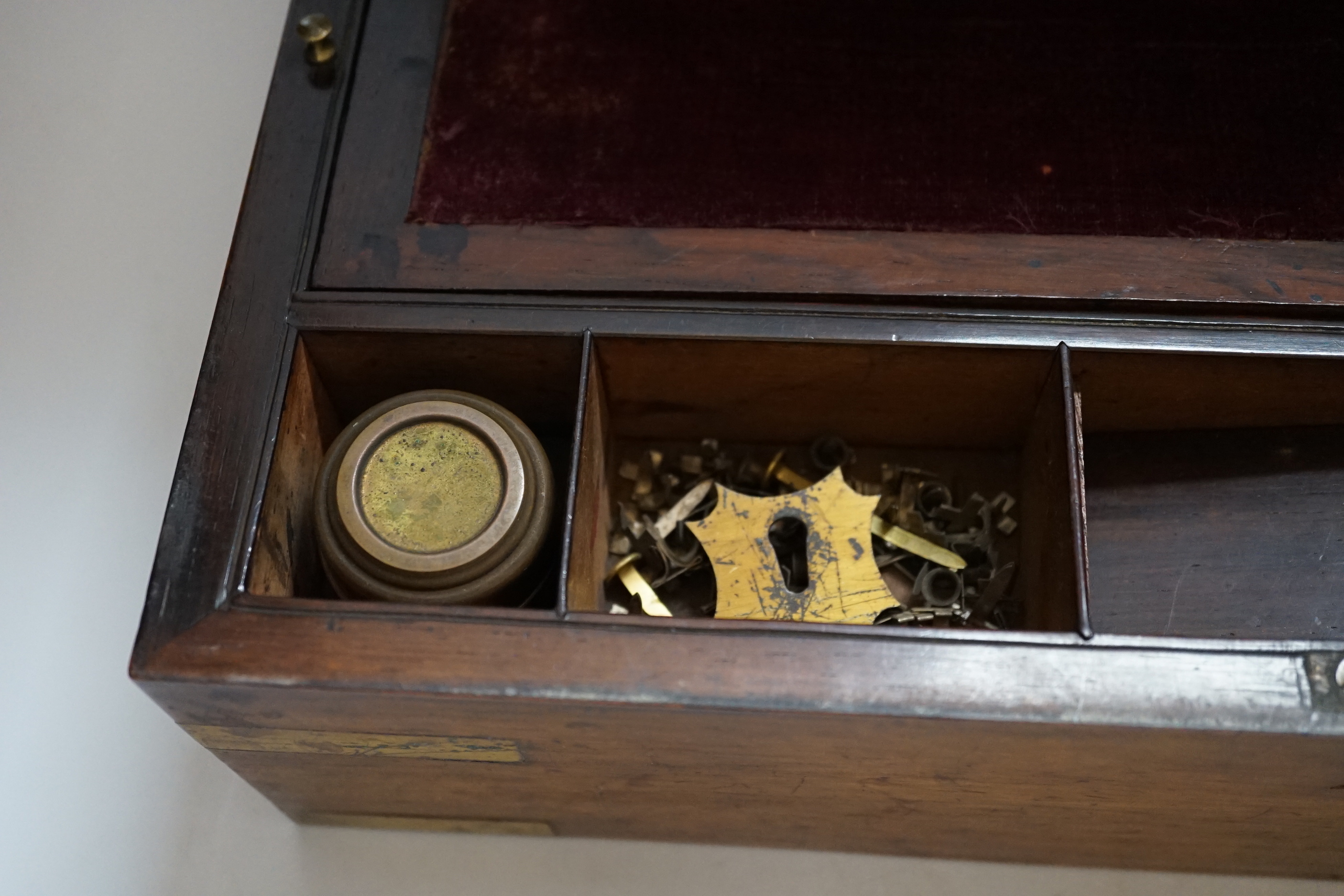 A Victorian rosewood brass bound writing slope, 40cm wide x 15cm high